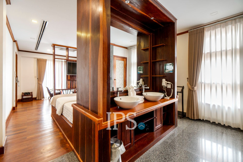 14-Room Boutique Hotel Business For Sale in Svay Dangkum, Siem Reap